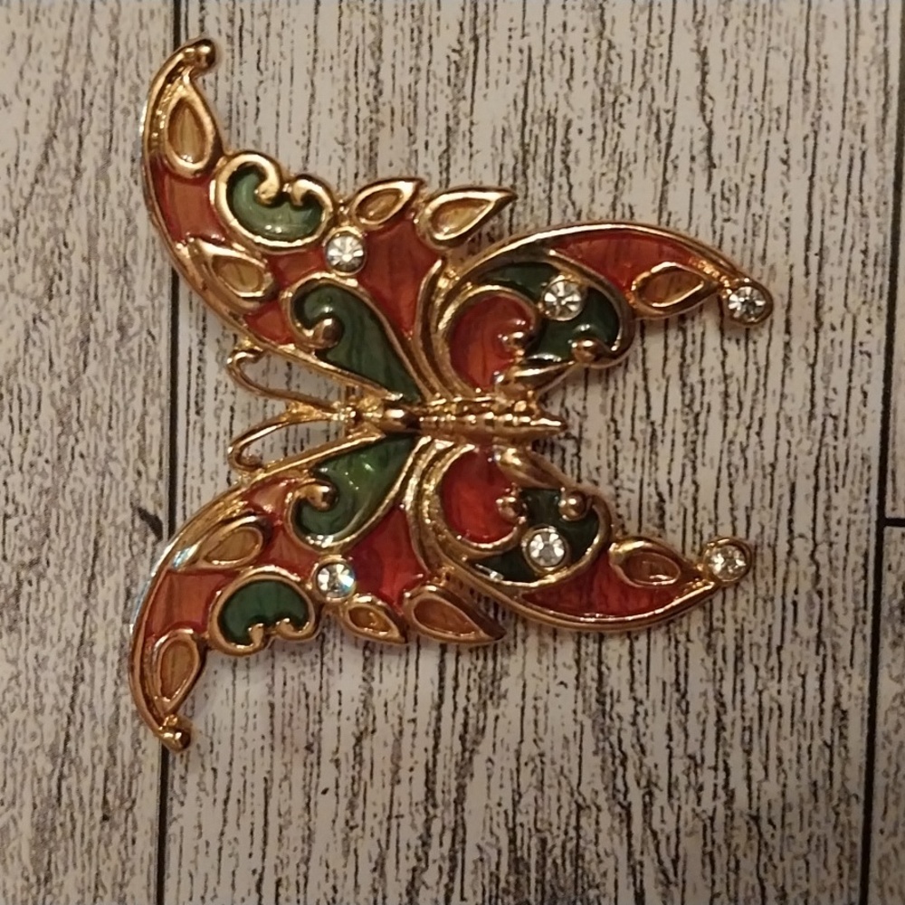 Orange and green butterfly pin